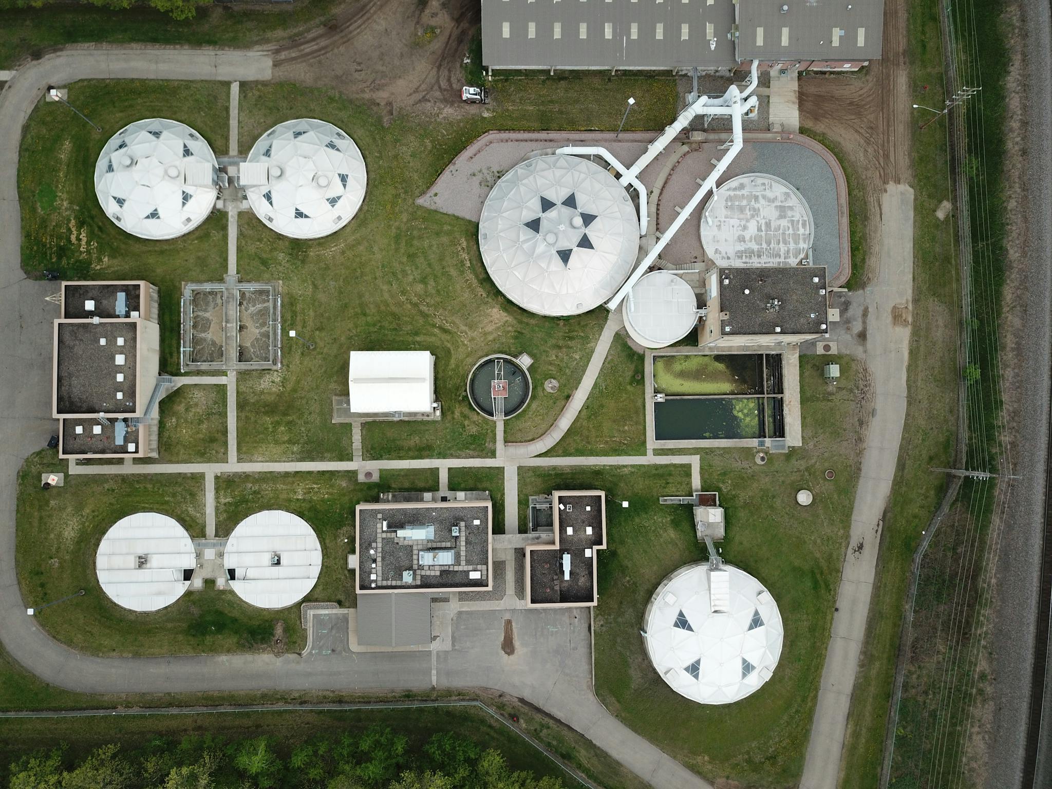 Aerial view of a structured water treatment plant showcasing various components.